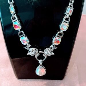 Elegant Silver Necklace with Iridescent Accents 20” around the neckline.